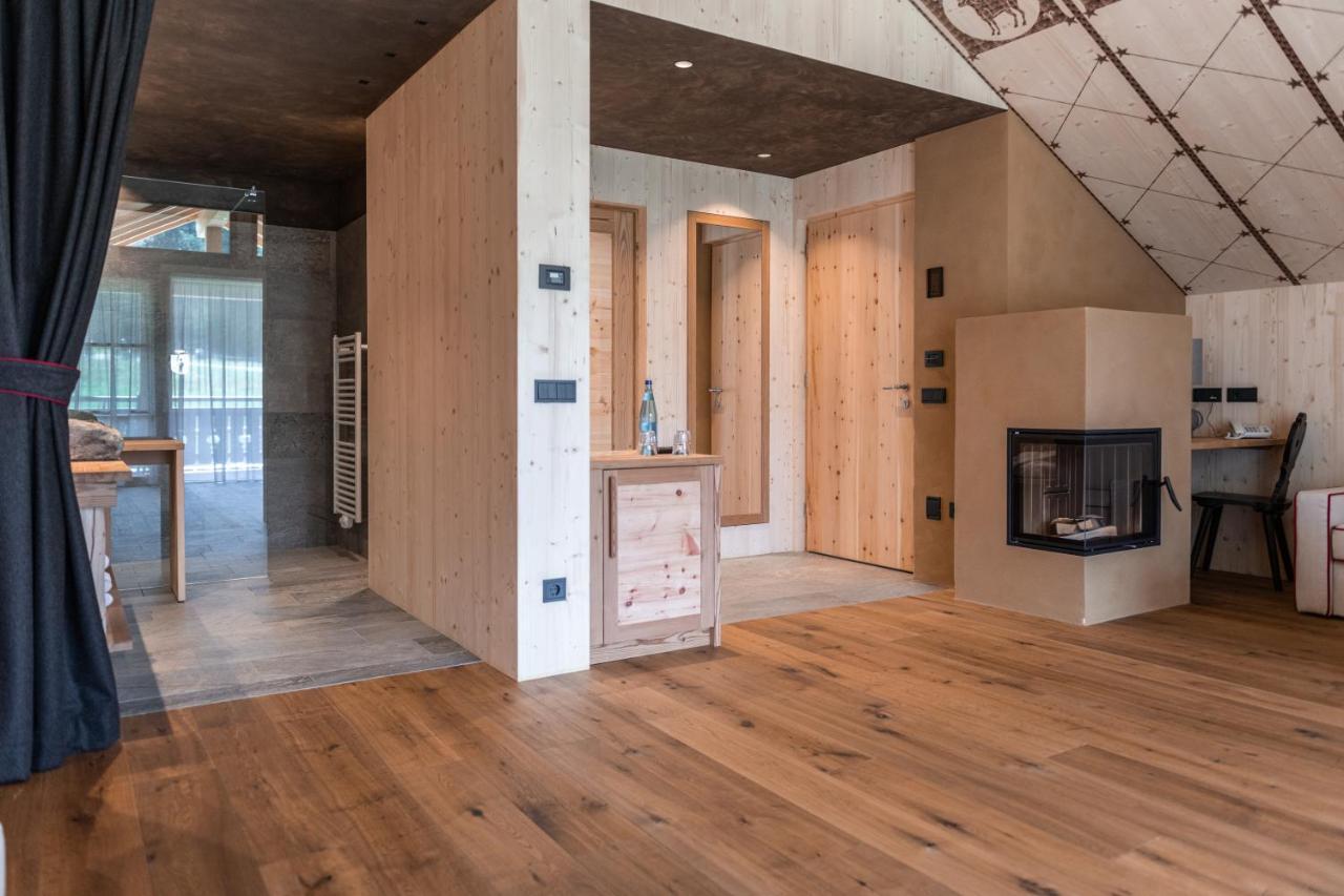 אלפה די סיוסי Dolomites Living Hotel Tirler מראה חיצוני תמונה